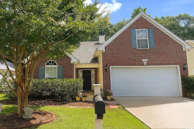 364 Vesta Dr, Myrtle Beach, SC 29579 - traditional home featuring brick siding, driveway, a shingled roof, a chimney, and a front yard