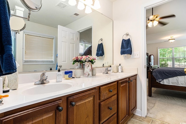 364 Vesta Dr, Myrtle Beach, SC 29579 - ensuite bathroom with double vanity and tile patterned flooring