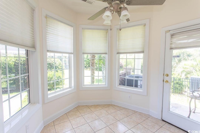 413 Sea Vista Ln, North Myrtle Beach, SC 29582 - unfurnished sunroom with tile patterned flooring