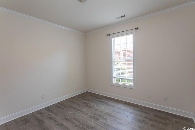 413 Sea Vista Ln, North Myrtle Beach, SC 29582 - spare room featuring dark wood-type flooring and crown molding