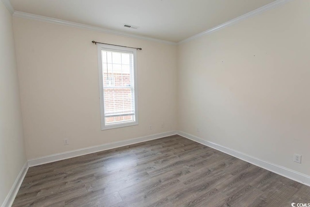 413 Sea Vista Ln, North Myrtle Beach, SC 29582 - unfurnished room featuring dark wood-style floors and ornamental molding