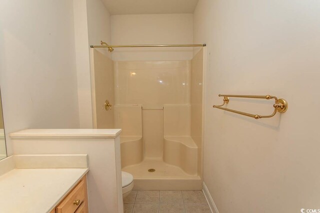 413 Sea Vista Ln, North Myrtle Beach, SC 29582 - full bath featuring tile patterned flooring, vanity, and a shower