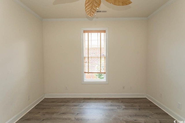 413 Sea Vista Ln, North Myrtle Beach, SC 29582 - spare room with plenty of natural light, dark wood-type flooring, ceiling fan, and crown molding