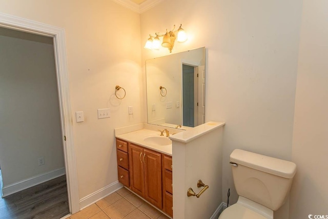 413 Sea Vista Ln, North Myrtle Beach, SC 29582 - half bathroom featuring vanity, ornamental molding, and tile patterned floors