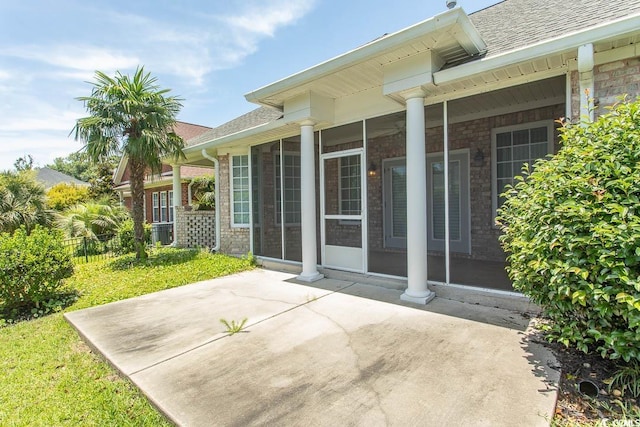 413 Sea Vista Ln, North Myrtle Beach, SC 29582 - view of patio / terrace with a sunroom