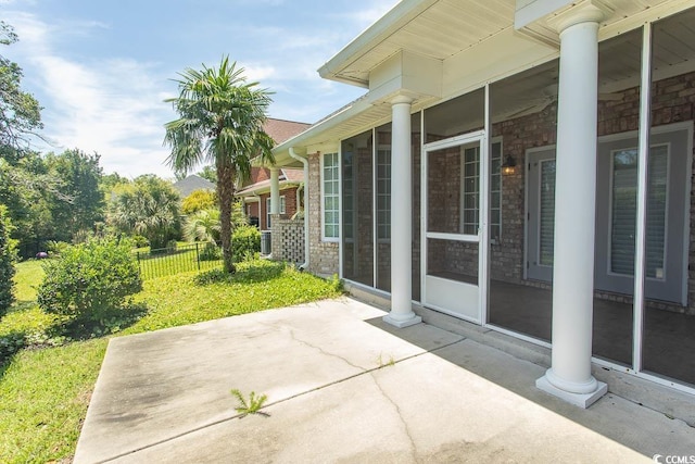 413 Sea Vista Ln, North Myrtle Beach, SC 29582 - view of patio / terrace with a sunroom