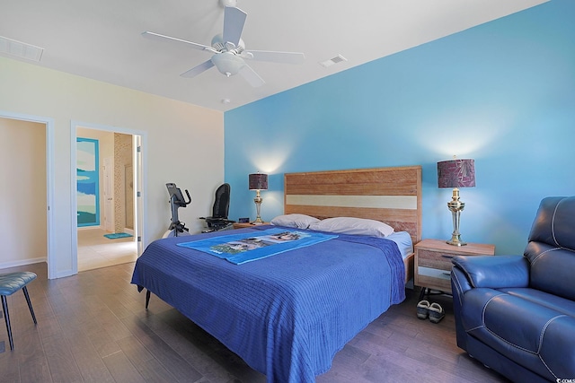 232 Angel Wing Dr, Myrtle Beach, SC 29588 - bedroom with wood finished floors, ceiling fan, and connected bathroom