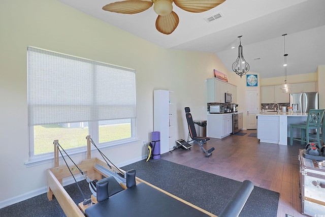232 Angel Wing Dr, Myrtle Beach, SC 29588 - workout area with ceiling fan, healthy amount of natural light, lofted ceiling, and dark wood finished floors