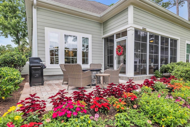 124 Turtle Creek Dr, Pawleys Island, SC 29585 - view of patio / terrace featuring area for grilling and a sunroom