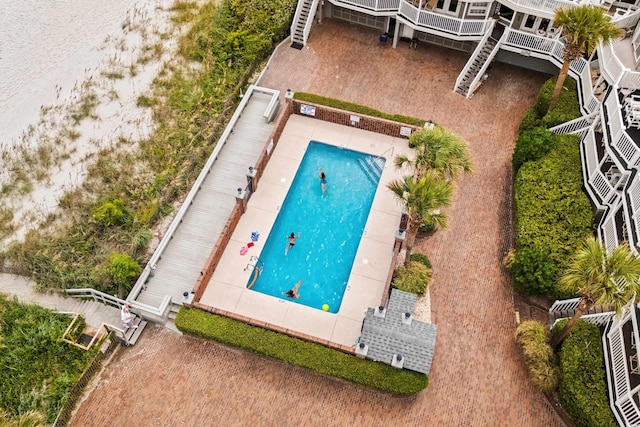 1217 S Ocean Blvd Unit 5, Surfside Beach, SC 29575 - aerial view of property and surrounding area featuring a pool