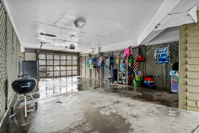 1217 S Ocean Blvd Unit 5, Surfside Beach, SC 29575 - garage with a garage door opener