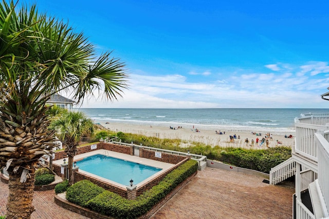 1217 S Ocean Blvd Unit 5, Surfside Beach, SC 29575 - view of pool featuring view of water and beach and a jacuzzi