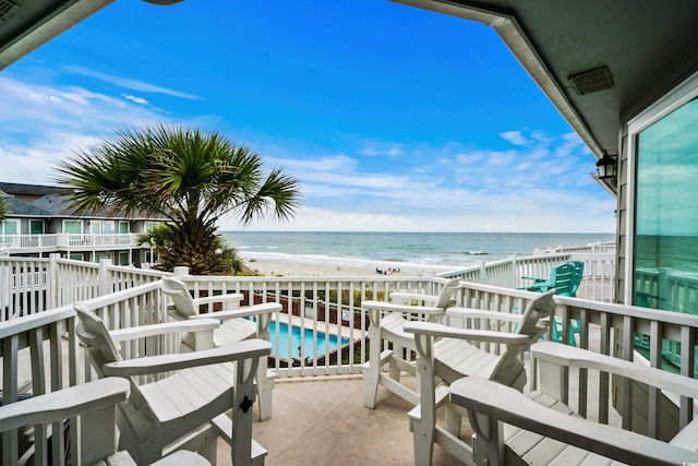 1217 S Ocean Blvd Unit 5, Surfside Beach, SC 29575 - balcony featuring view of water and beach