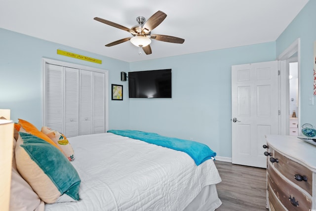 1217 S Ocean Blvd Unit 5, Surfside Beach, SC 29575 - bedroom featuring wood finished floors, a closet, and a ceiling fan