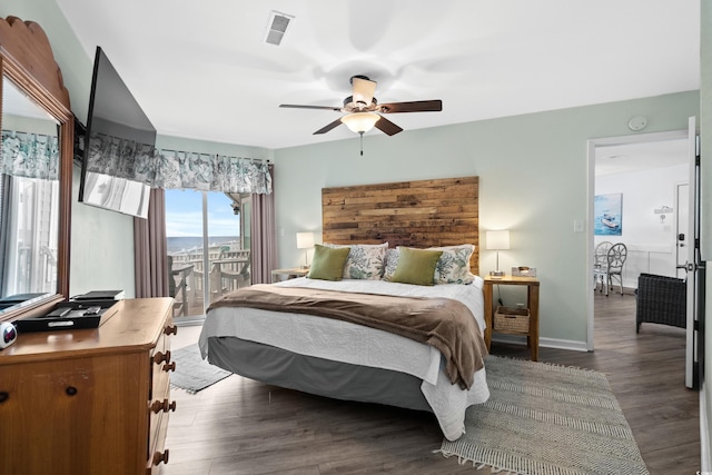 1217 S Ocean Blvd Unit 5, Surfside Beach, SC 29575 - bedroom with wood finished floors and a ceiling fan