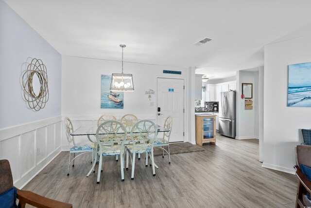1217 S Ocean Blvd Unit 5, Surfside Beach, SC 29575 - dining room featuring wood finished floors