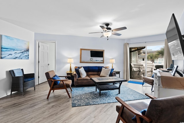 1217 S Ocean Blvd Unit 5, Surfside Beach, SC 29575 - living area with light wood-style floors and a ceiling fan