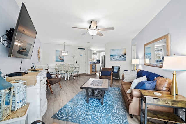1217 S Ocean Blvd Unit 5, Surfside Beach, SC 29575 - living room with a ceiling fan and light wood-style floors