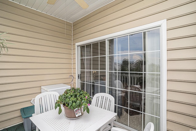 2000 Cross Gate Blvd Unit 202, Surfside Beach, SC 29575 - balcony featuring outdoor dining space and ceiling fan