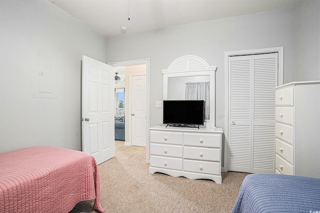 2000 Cross Gate Blvd Unit 202, Surfside Beach, SC 29575 - bedroom featuring light colored carpet, a closet, and electric panel