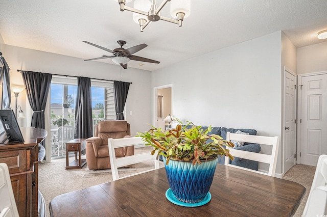 2000 Cross Gate Blvd Unit 202, Surfside Beach, SC 29575 - dining area featuring ceiling fan and a chandelier
