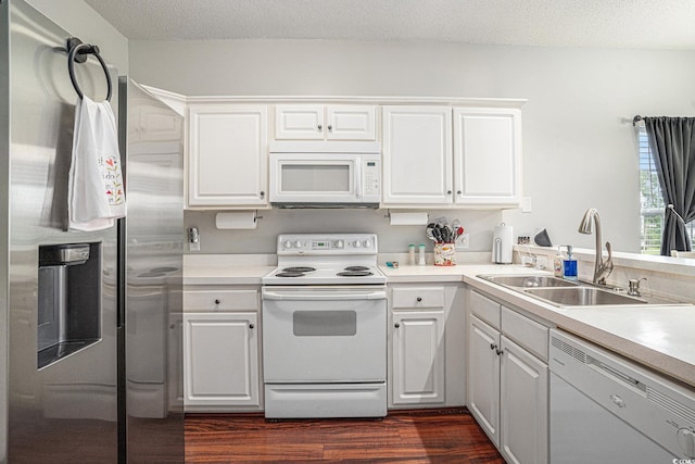 2000 Cross Gate Blvd Unit 202, Surfside Beach, SC 29575 - kitchen featuring white appliances, dark wood-style flooring, white cabinetry, light countertops, and a textured ceiling