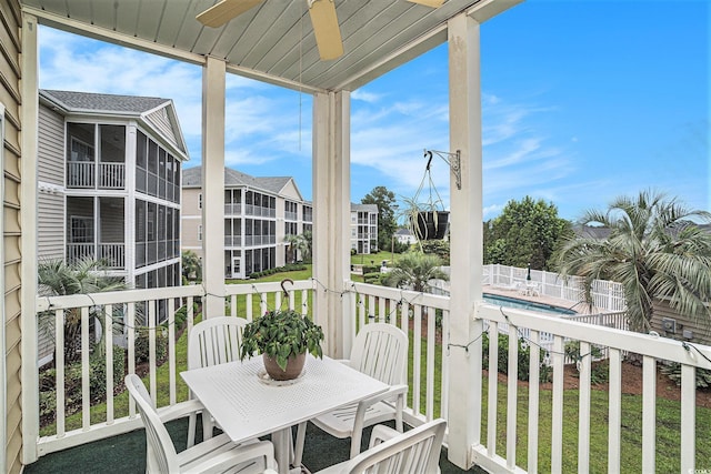 2000 Cross Gate Blvd Unit 202, Surfside Beach, SC 29575 - sunroom featuring ceiling fan and outdoor dining space