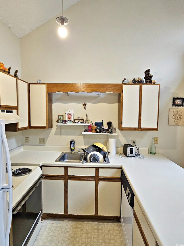 500 Fairway Village Dr Unit 9-K, Myrtle Beach, SC 29588 - kitchen featuring white appliances, ventilation hood, light countertops, white cabinetry, and vaulted ceiling