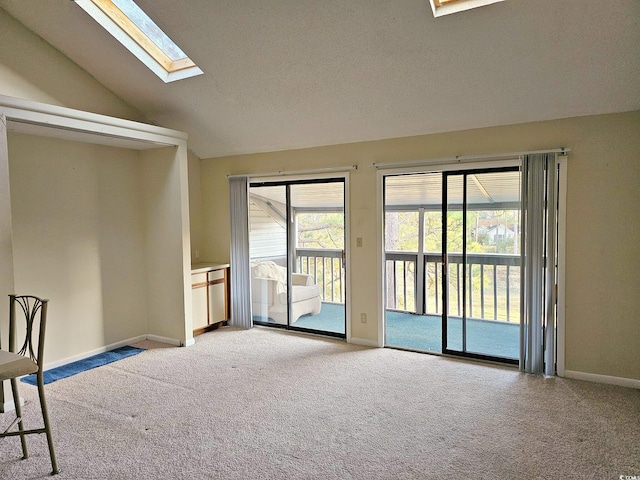 500 Fairway Village Dr Unit 9-K, Myrtle Beach, SC 29588 - spare room with light carpet, lofted ceiling, and a skylight