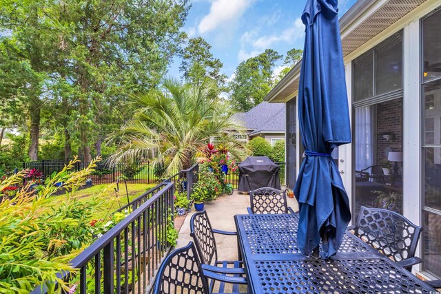 139 Olde Canal Loop, Pawleys Island, SC 29585 - view of patio featuring outdoor dining space and area for grilling