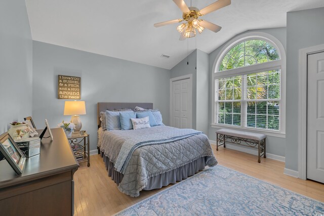 139 Olde Canal Loop, Pawleys Island, SC 29585 - bedroom with lofted ceiling, light wood-style flooring, and a ceiling fan