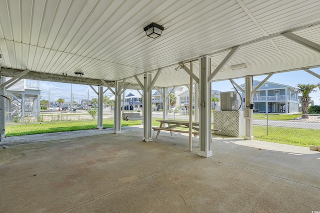 3307 Nixon St, North Myrtle Beach, SC 29582 - view of patio / terrace featuring a carport and a residential view