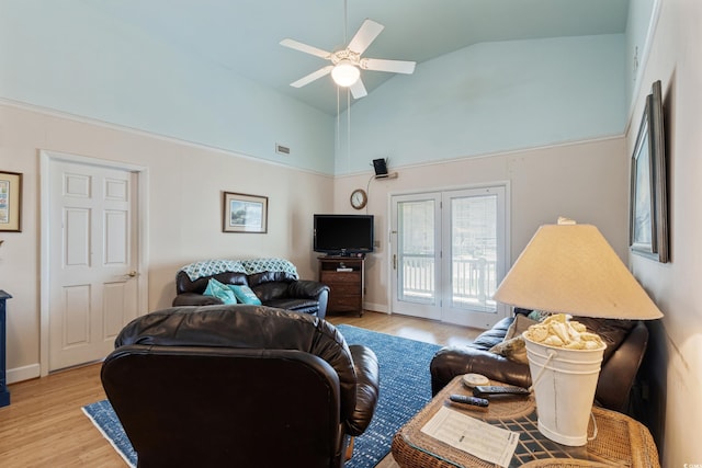 3307 Nixon St, North Myrtle Beach, SC 29582 - living room with light wood-type flooring, ceiling fan, and high vaulted ceiling