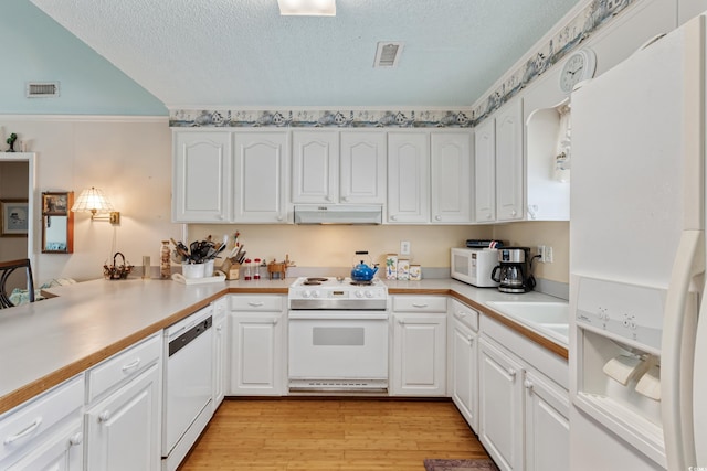 3307 Nixon St, North Myrtle Beach, SC 29582 - kitchen featuring white appliances, under cabinet range hood, a textured ceiling, white cabinetry, and light wood-style flooring