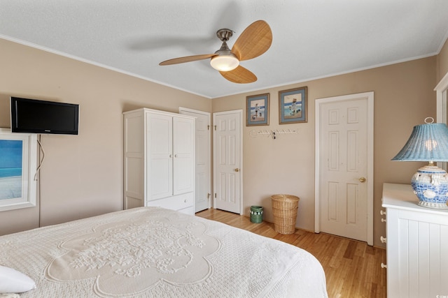 3307 Nixon St, North Myrtle Beach, SC 29582 - bedroom featuring light wood-style floors, ornamental molding, and a ceiling fan