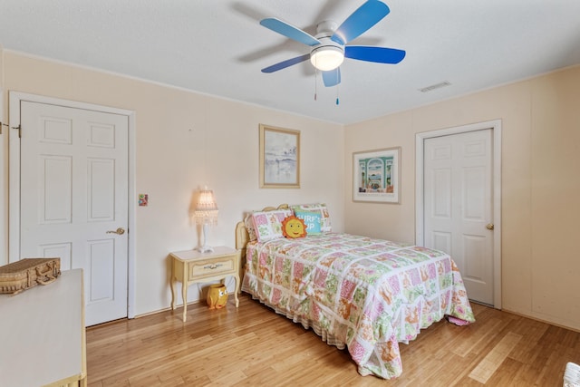 3307 Nixon St, North Myrtle Beach, SC 29582 - bedroom with light wood-style floors, ceiling fan, and crown molding