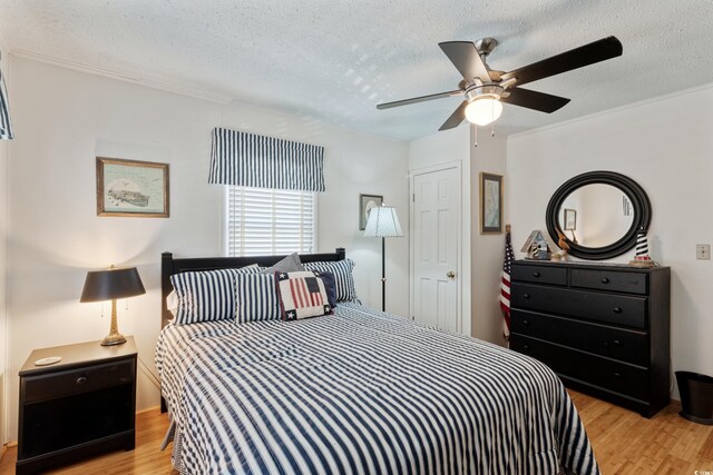3307 Nixon St, North Myrtle Beach, SC 29582 - bedroom featuring a textured ceiling, wood finished floors, and ceiling fan