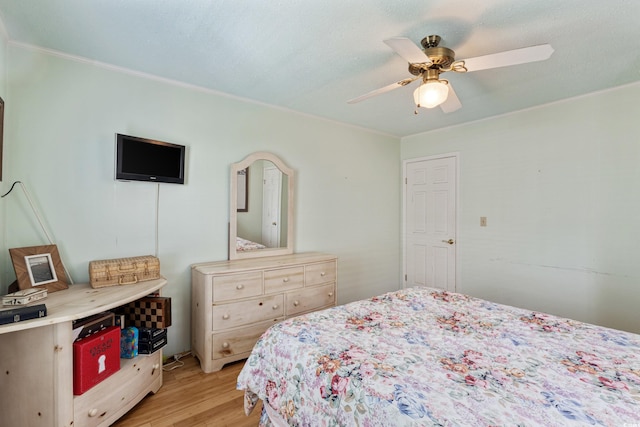 3307 Nixon St, North Myrtle Beach, SC 29582 - bedroom with light wood-type flooring, ornamental molding, and ceiling fan