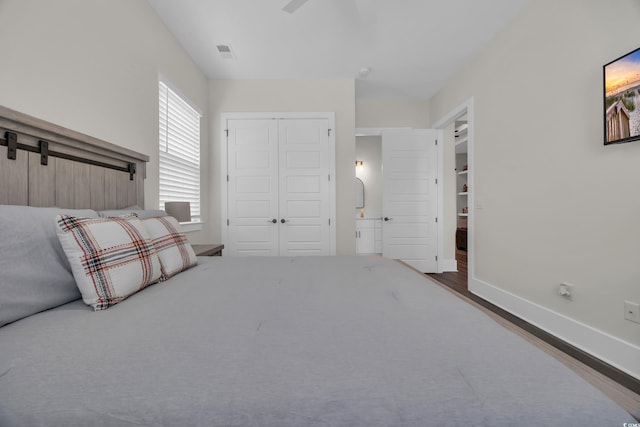 1024 Pochard Dr, Conway, SC 29526 - bedroom with wood finished floors and a closet