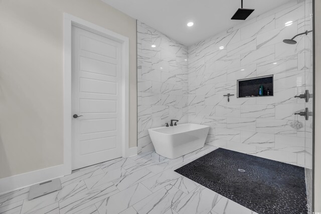 1024 Pochard Dr, Conway, SC 29526 - bathroom featuring marble finish floors, a freestanding tub, a marble finish shower, and recessed lighting