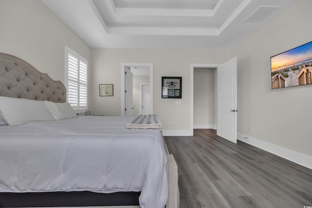 1024 Pochard Dr, Conway, SC 29526 - bedroom featuring a raised ceiling and dark wood-type flooring