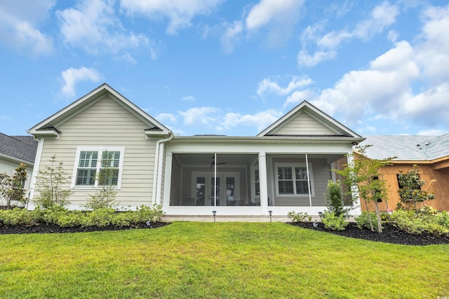 1024 Pochard Dr, Conway, SC 29526 - back of property featuring a lawn and a sunroom