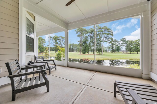 1024 Pochard Dr, Conway, SC 29526 - sunroom / solarium with a water view, golf course view, a ceiling fan, and view of scattered trees