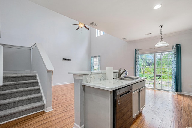 1120 Fairway Ln Unit 1120, Conway, SC 29526 - kitchen with stainless steel dishwasher, light wood-style flooring, healthy amount of natural light, and recessed lighting