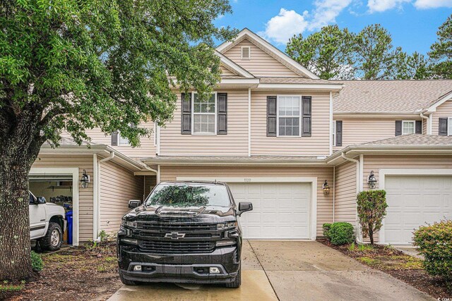 1120 Fairway Ln Unit 1120, Conway, SC 29526 - multi unit property featuring driveway and an attached garage
