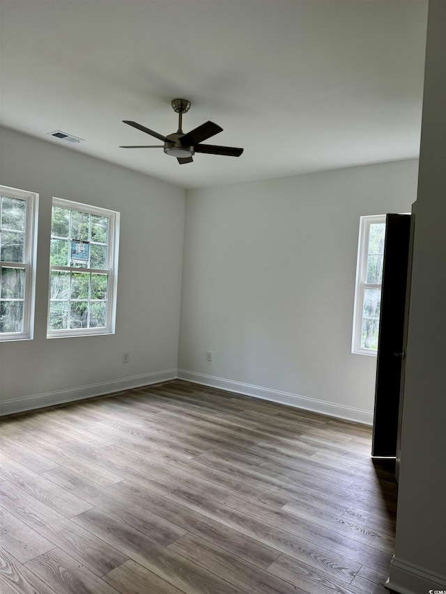 2075 Lees Landing Cir, Conway, SC 29526 - spare room with wood finished floors and ceiling fan