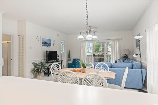 4261 Hibiscus Dr Unit 4-104, Little River, SC 29566 - dining space with a chandelier and ornamental molding