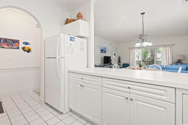 4261 Hibiscus Dr Unit 4-104, Little River, SC 29566 - kitchen with freestanding refrigerator, a chandelier, light countertops, open floor plan, and crown molding