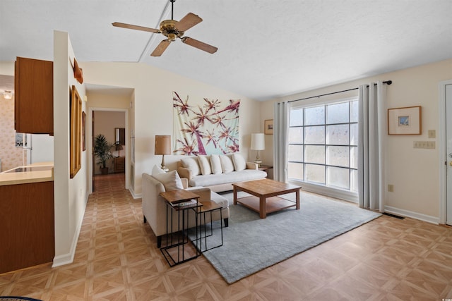 1145 Forest Dr, North Myrtle Beach, SC 29582 - living room featuring vaulted ceiling and a ceiling fan