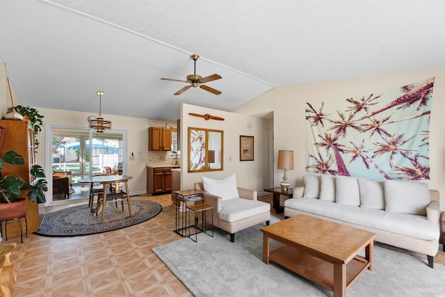 1145 Forest Dr, North Myrtle Beach, SC 29582 - living room featuring lofted ceiling and a ceiling fan